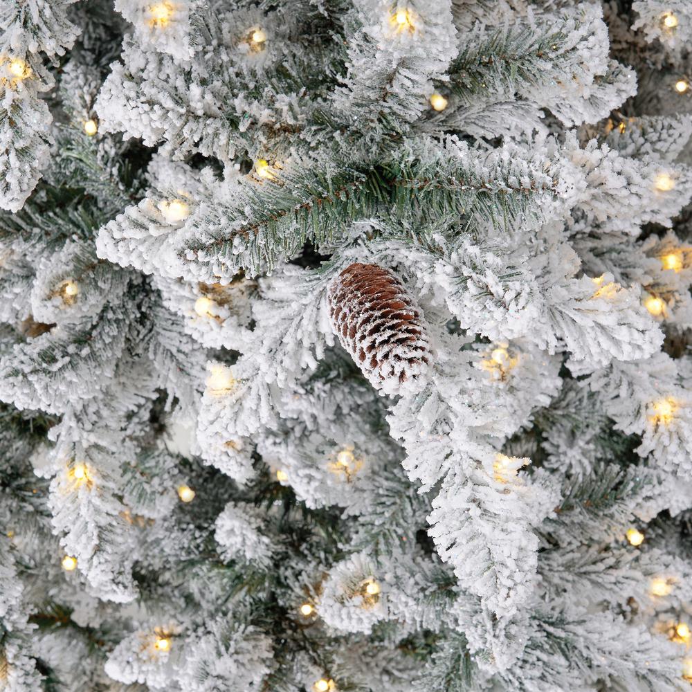 10ft. Flocked Livingston Fir Artificial Christmas Tree with Pine Cones. Picture 2