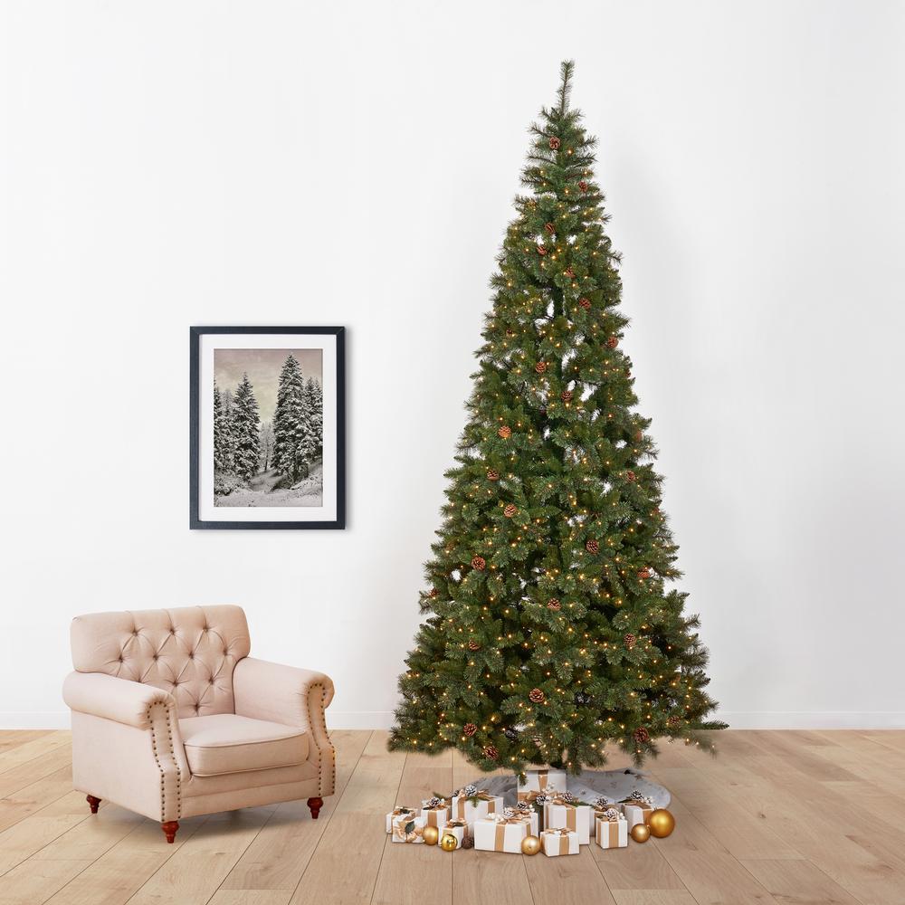 11ft. White Mountain Pine Artificial Christmas Tree with 1050 Clear LED Lights. Picture 10
