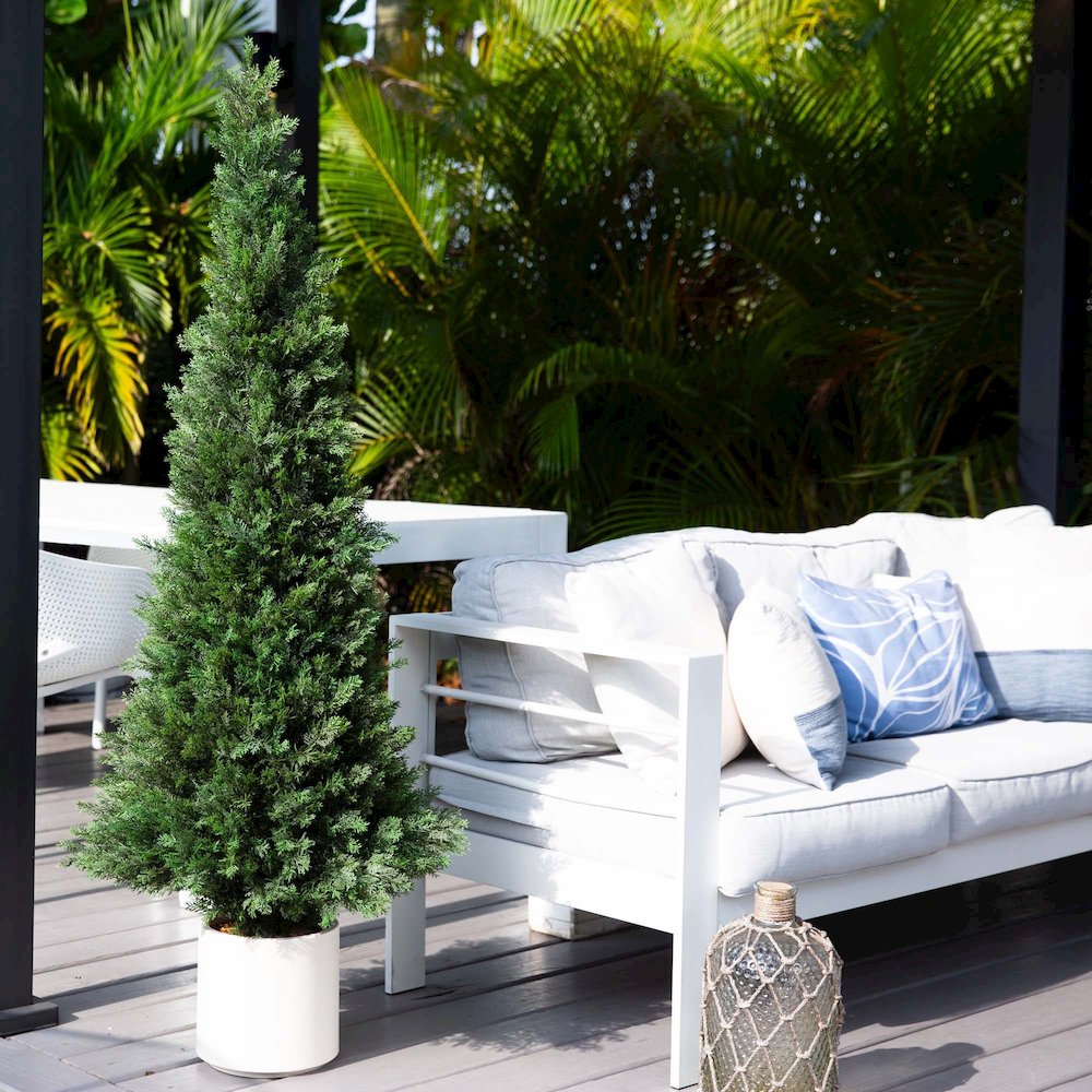 5ft. UV Resistant Artificial Cedar Tree in Decorative White Planter. Picture 3