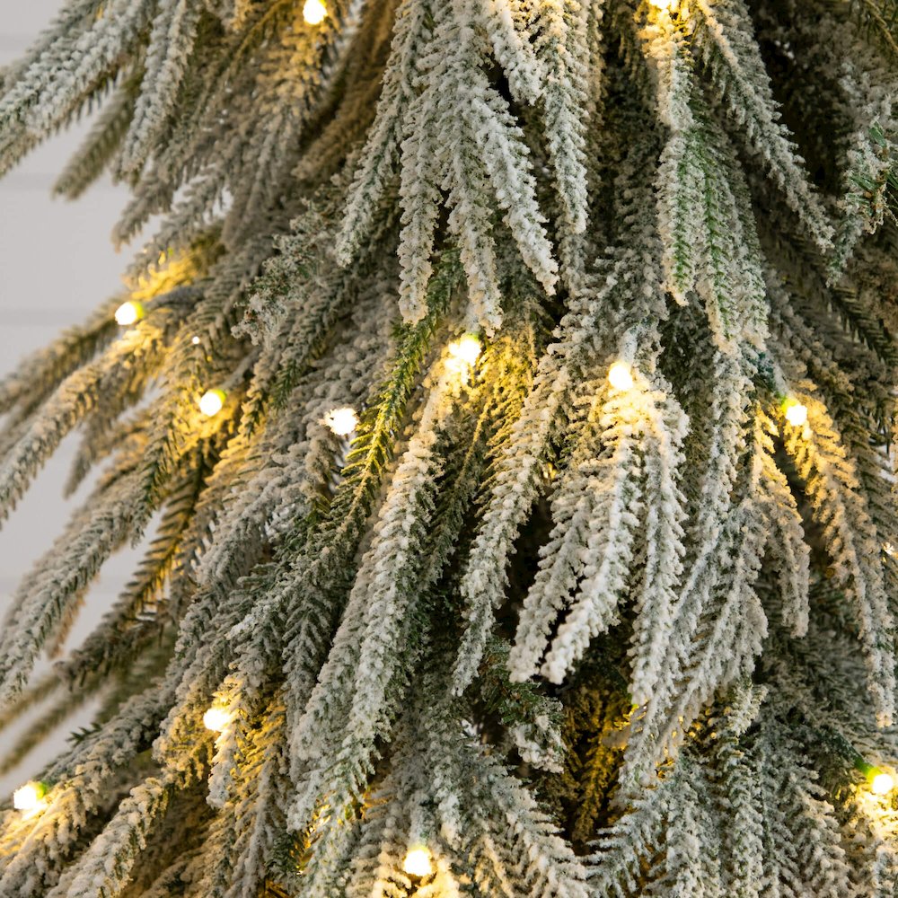 4ft. Flocked Down Swept Artificial Christmas Tree with 110 LED Lights. Picture 2