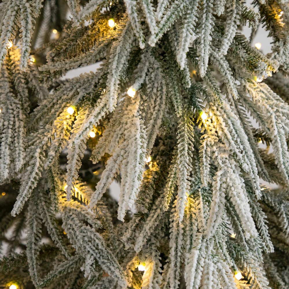 7ft. Flocked Down Swept Artificial Christmas Tree with 300 LED Lights. Picture 9