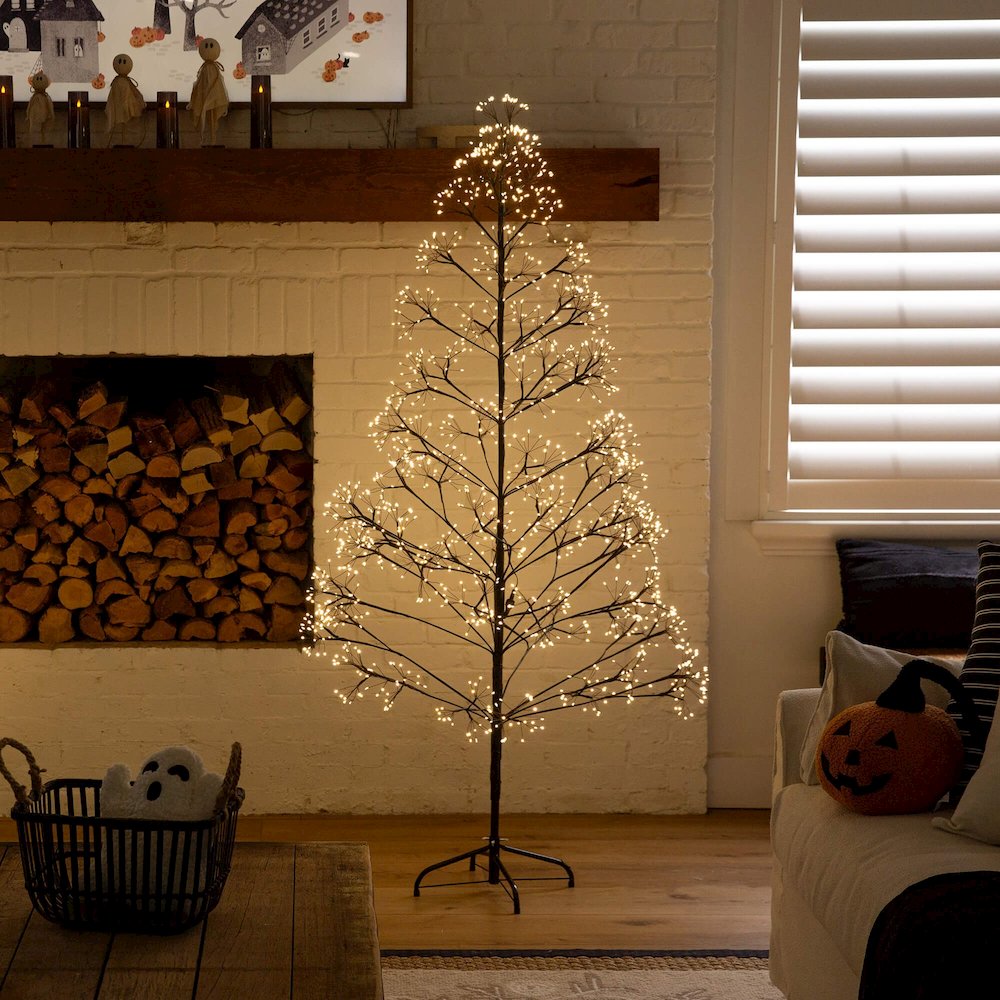 6ft Pre-Lit Artificial Halloween Black Starburst Tree with 1680 Fairy LED Lights. Picture 7