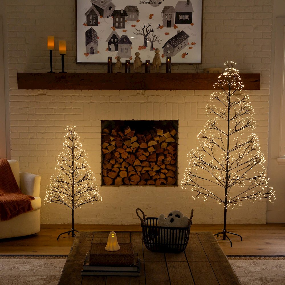 6ft Pre-Lit Artificial Halloween Black Starburst Tree with 1680 Fairy LED Lights. Picture 6