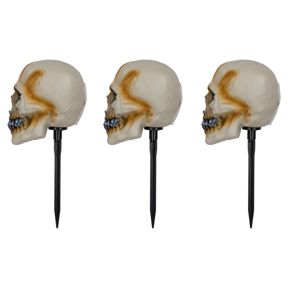 Set of 3 Lighted Skeleton Head Halloween Pathway Markers with Sound. Picture 3