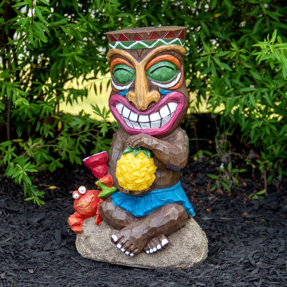 13.75" Solar Lighted Polynesian Outdoor Garden Smiling Tiki Statue. Picture 2