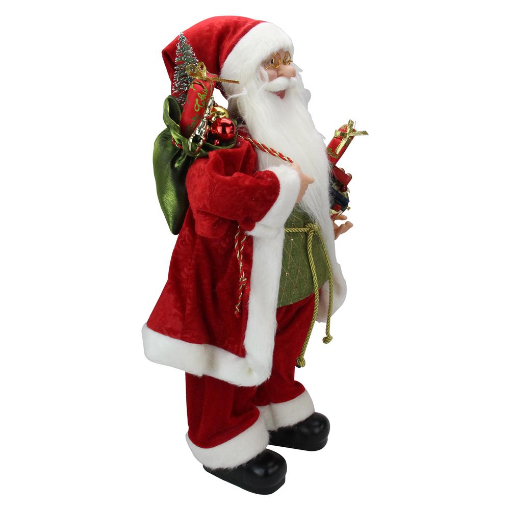 24" Red and White Santa Claus with Presents and Drum Christmas Figure. Picture 3