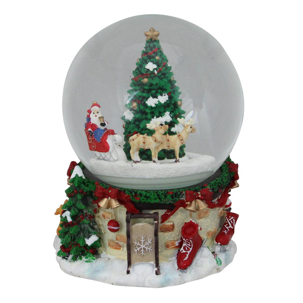 6.5" Musical and Animated Santa on Sleigh Rotating Christmas Snow Globe. Picture 1