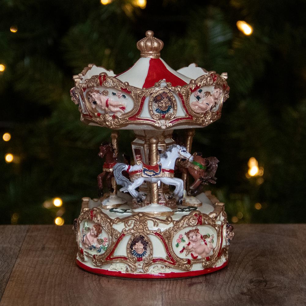6.5 Ivory and Gold Animated Musical Clown and Cupid Carousel Tabletop Decoration. Picture 4