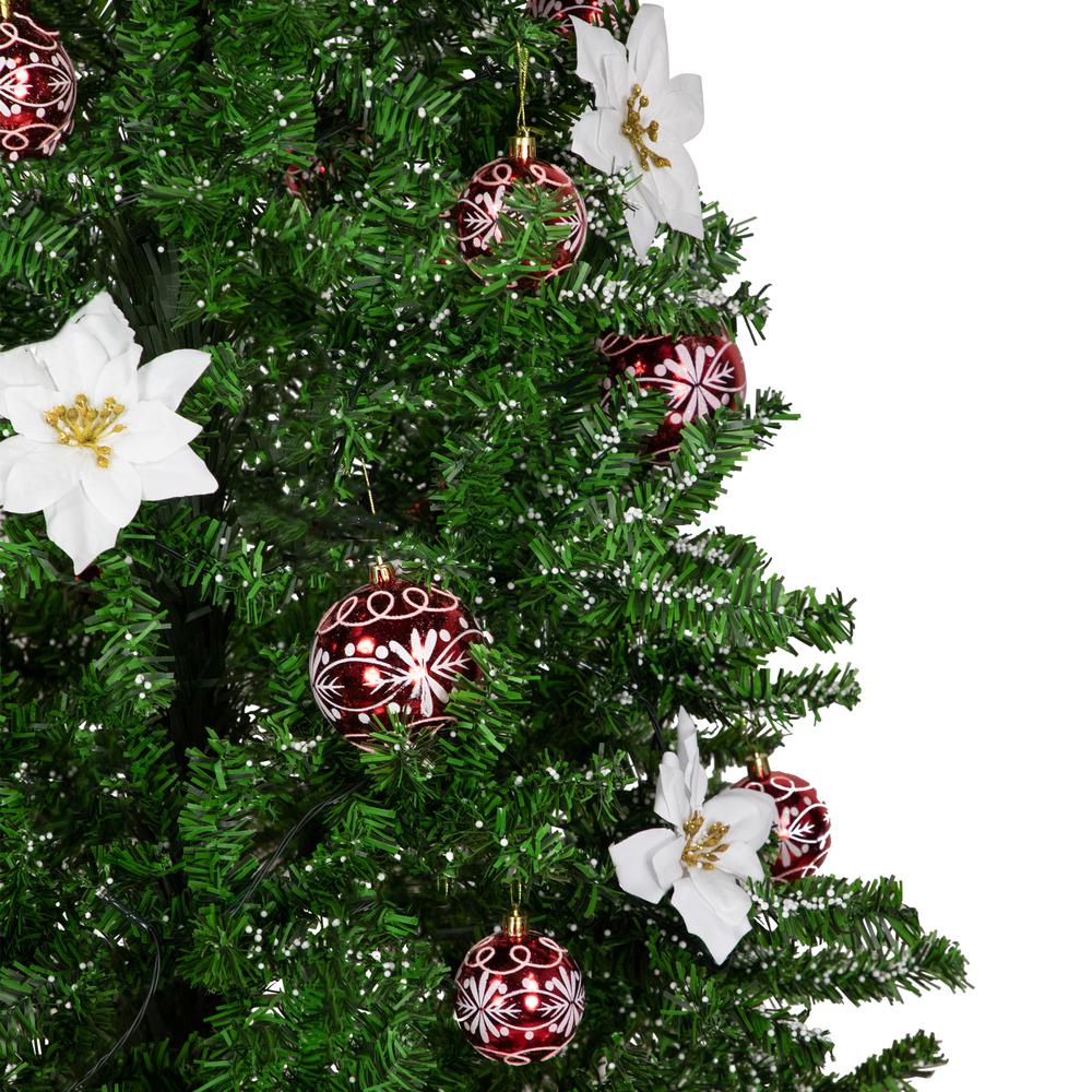 6' Green and Red Musical Lighted Snowing Christmas Tree White LED Lights. Picture 3
