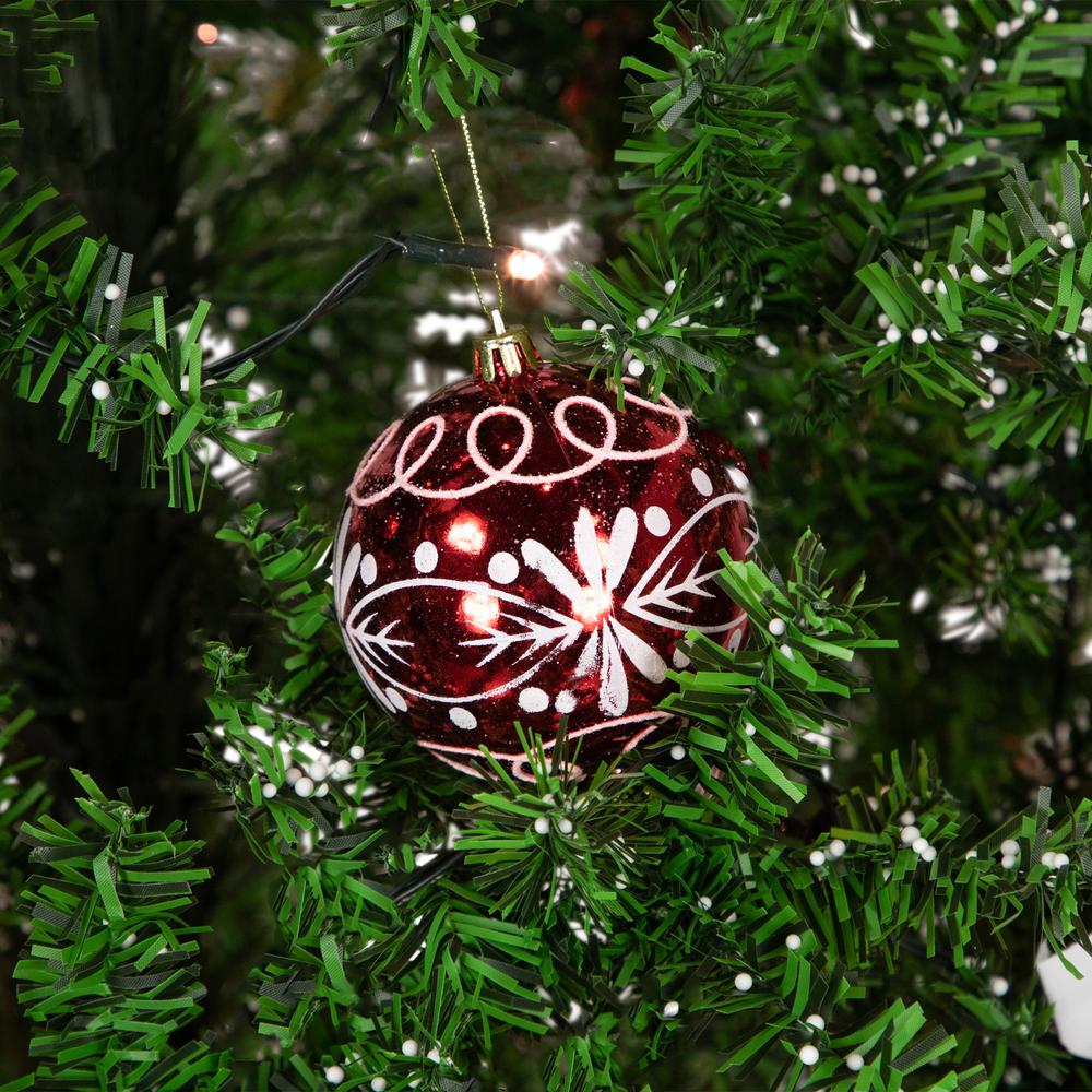 6' Green and Red Musical Lighted Snowing Christmas Tree White LED Lights. Picture 4