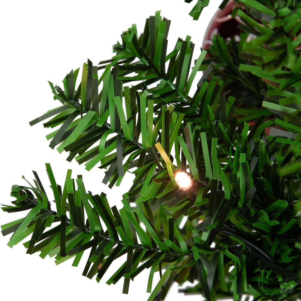6' Green and Red Musical Lighted Snowing Christmas Tree White LED Lights. Picture 2
