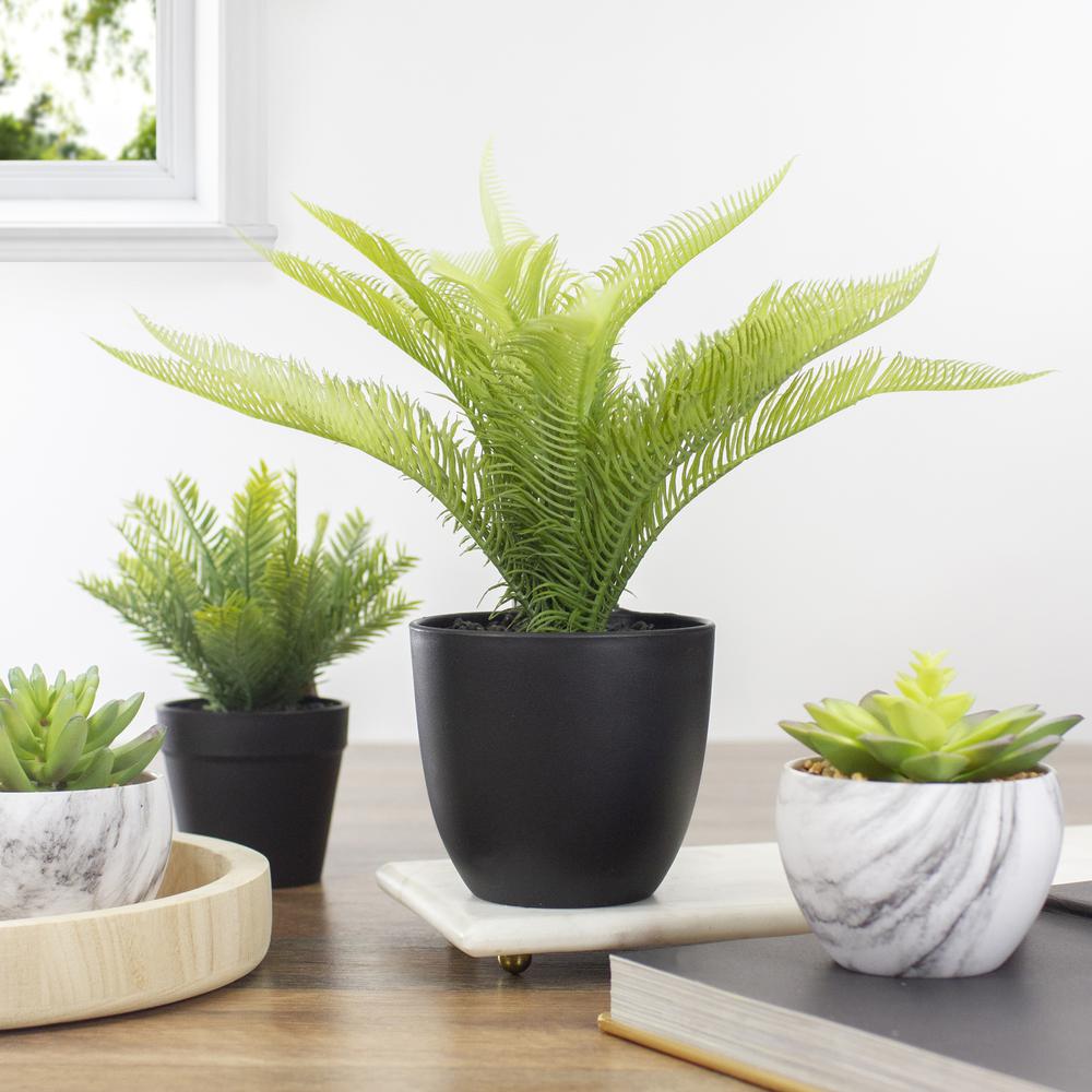 12" Potted Green Artificial Pinus Plant. Picture 2