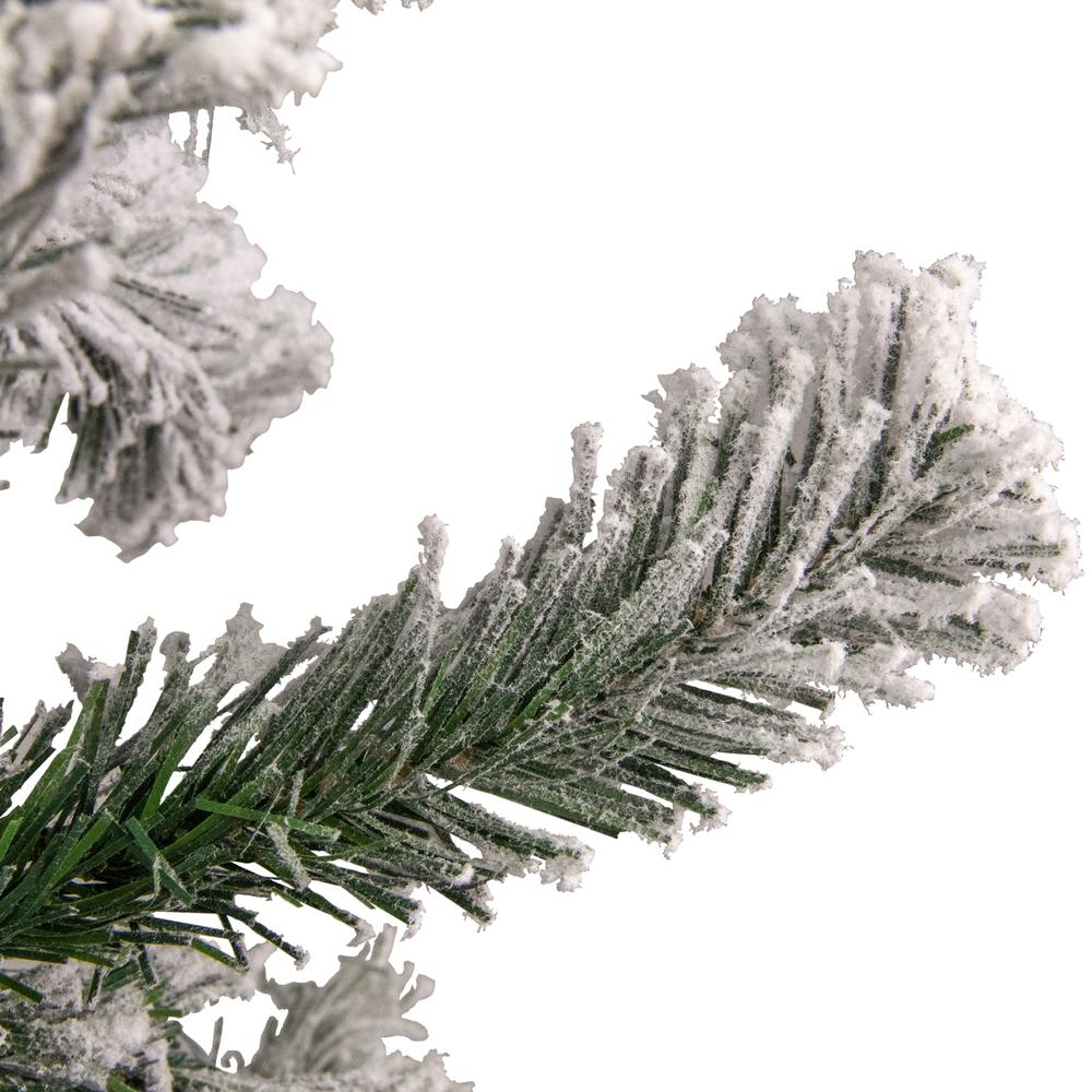4.5' Flocked Madison Pine Artificial Christmas Tree  Unlit. Picture 2