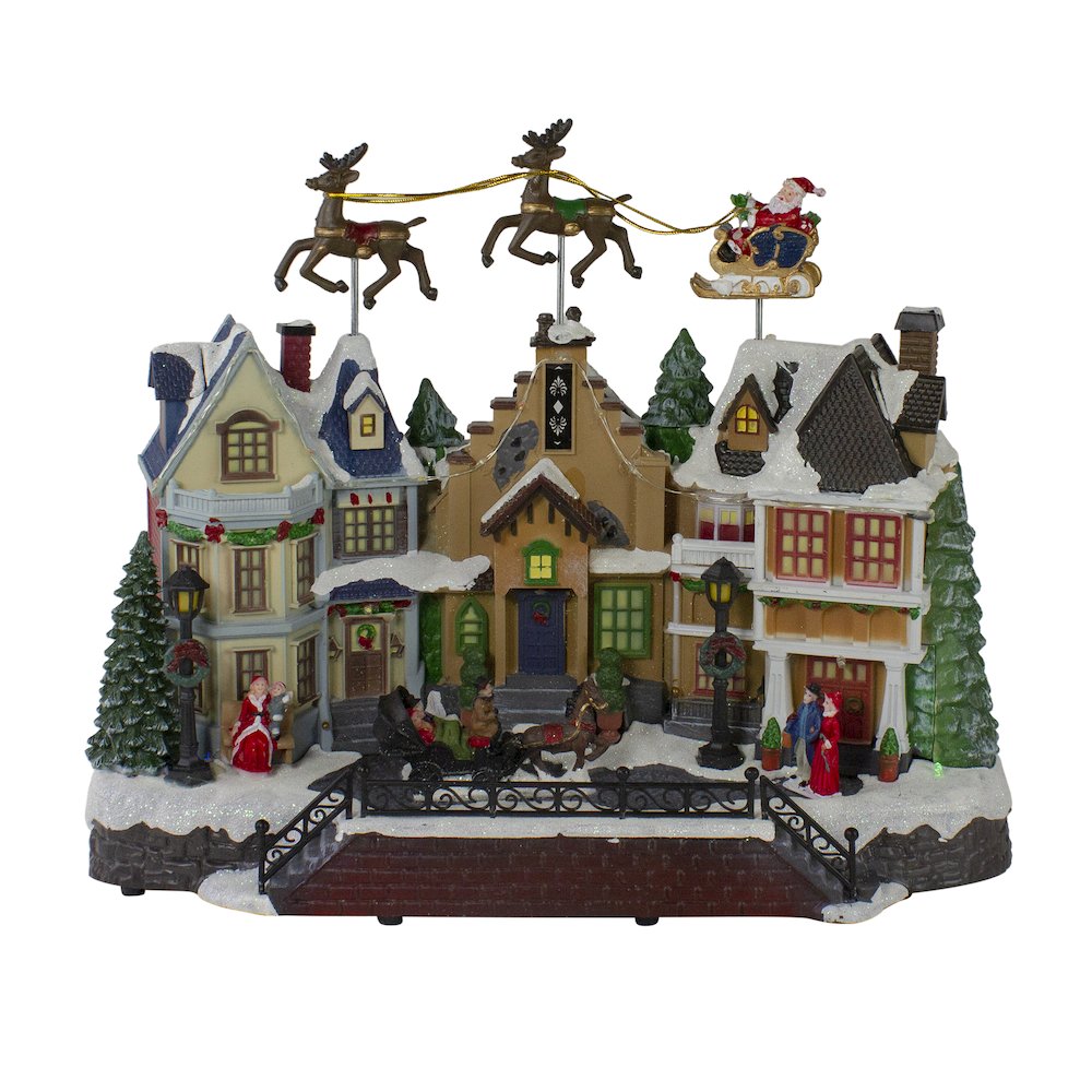 LED Lighted and Animated Christmas Village with Flying Sleigh Decoration - 16". Picture 1