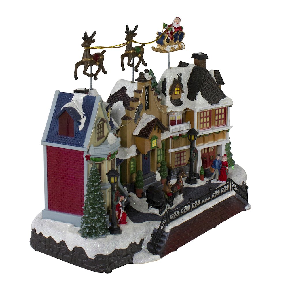 LED Lighted and Animated Christmas Village with Flying Sleigh Decoration - 16". Picture 3