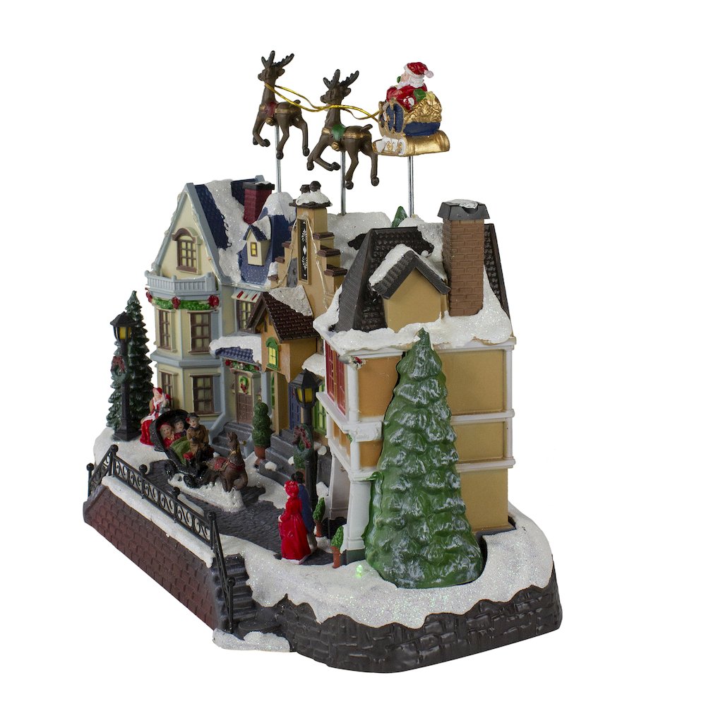 LED Lighted and Animated Christmas Village with Flying Sleigh Decoration - 16". Picture 4