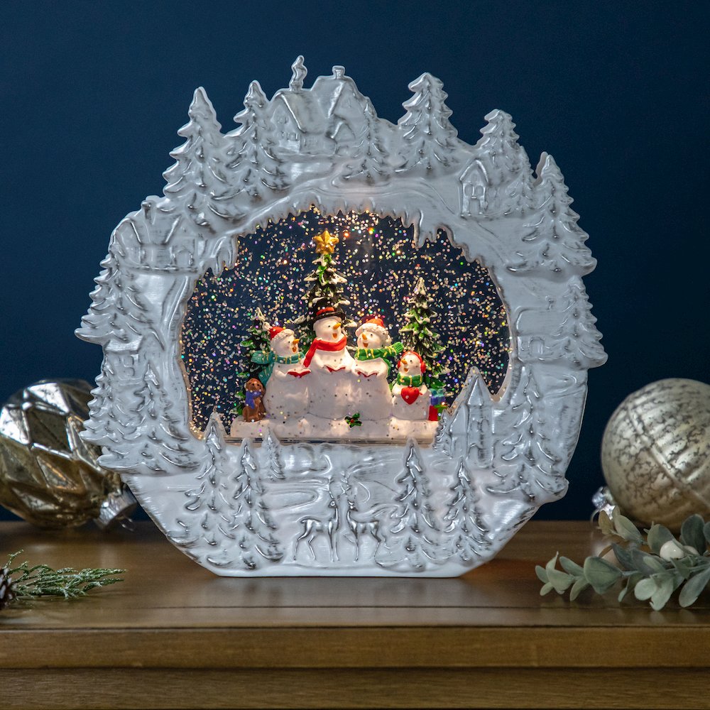 LED Lighted Caroling Snowmen Christmas Snow Globe - 9.5". Picture 1