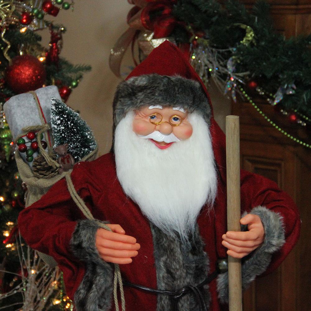 48" Red and Brown Standing Santa Claus Christmas Figurine with Walking Stick. Picture 3