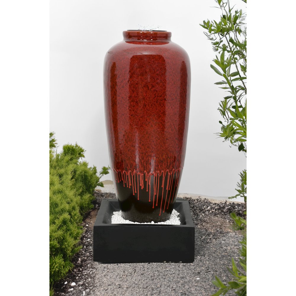 Red Bubbling Fountain With Base. Picture 2