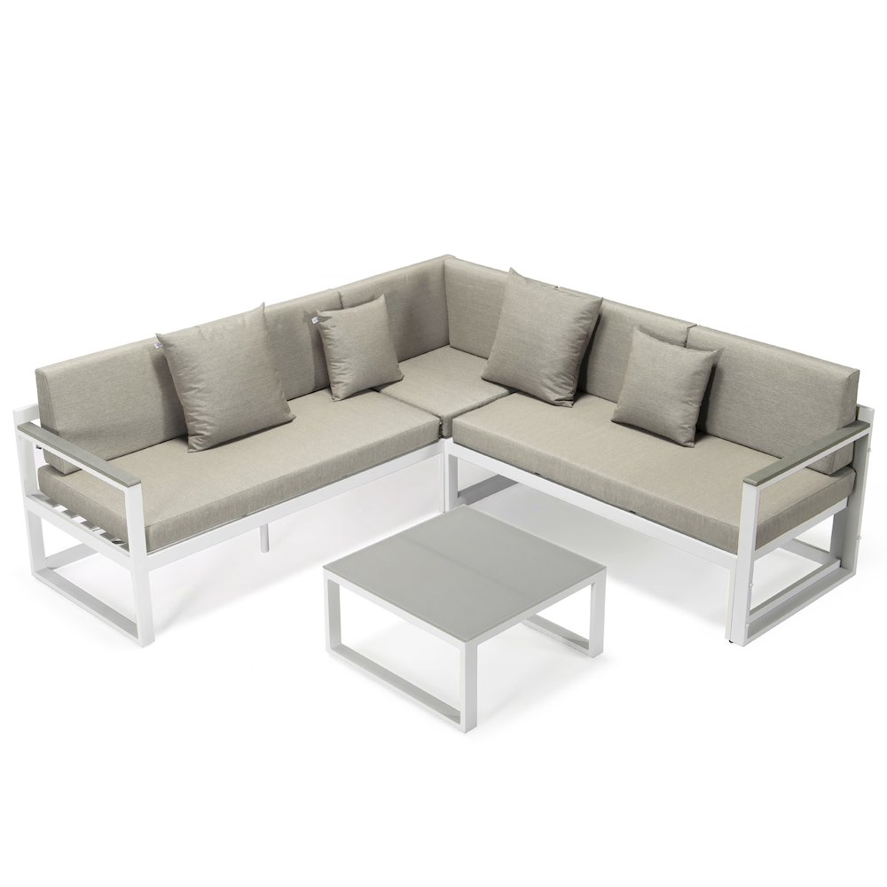 Chelsea White Sectional With Adjustable Headrest & Coffee Table With Cushions. Picture 1