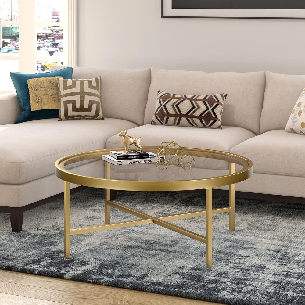 Xivil 36'' Wide Round Coffee Table with Glass Top in Brass. Picture 2