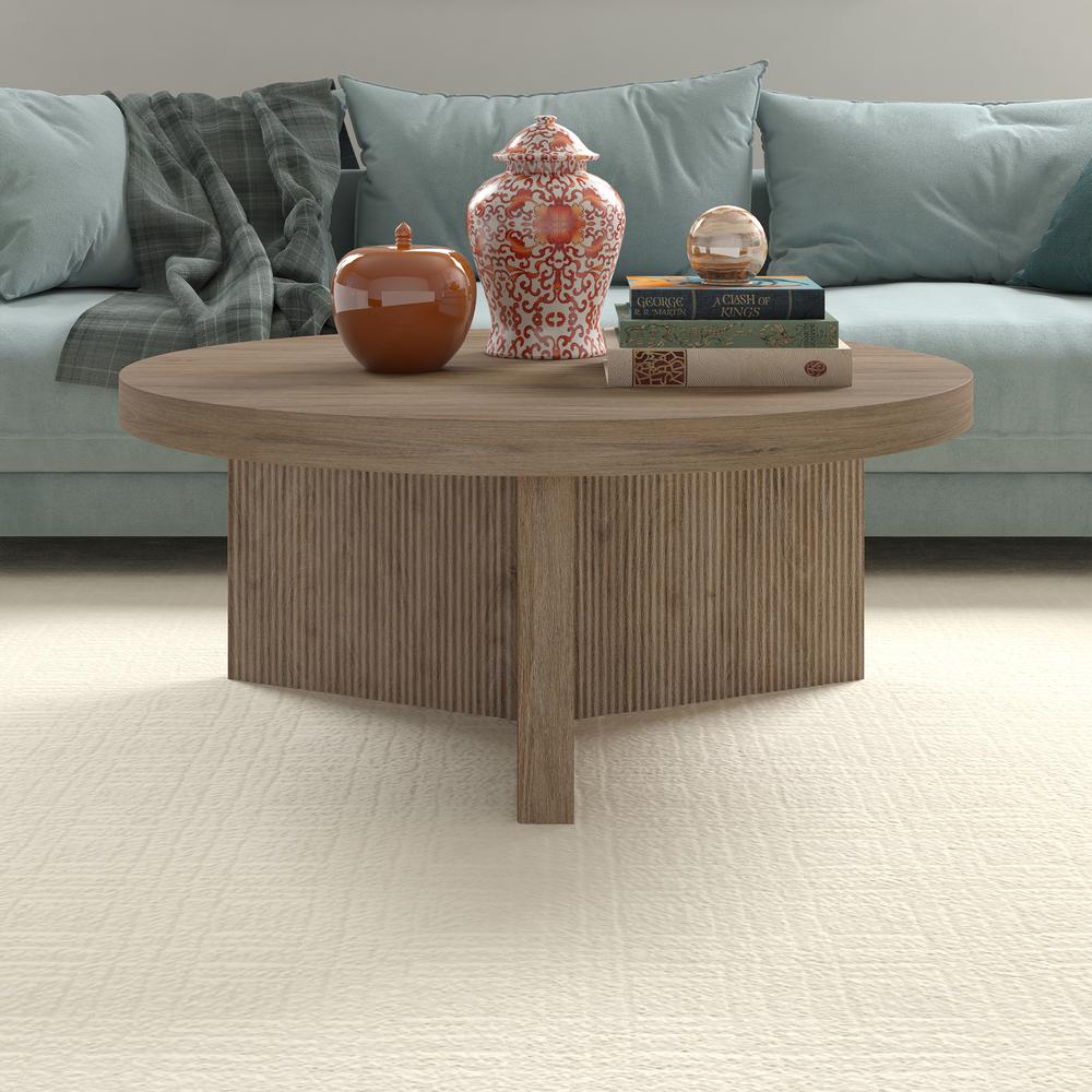 Holm 36" Wide Round Coffee Table in Antiqued Gray Oak. Picture 3