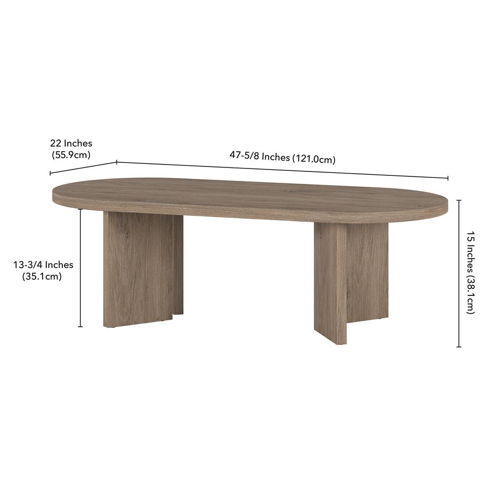 Alma 48" Wide Oval Coffee Table in Antiqued Gray Oak. Picture 5