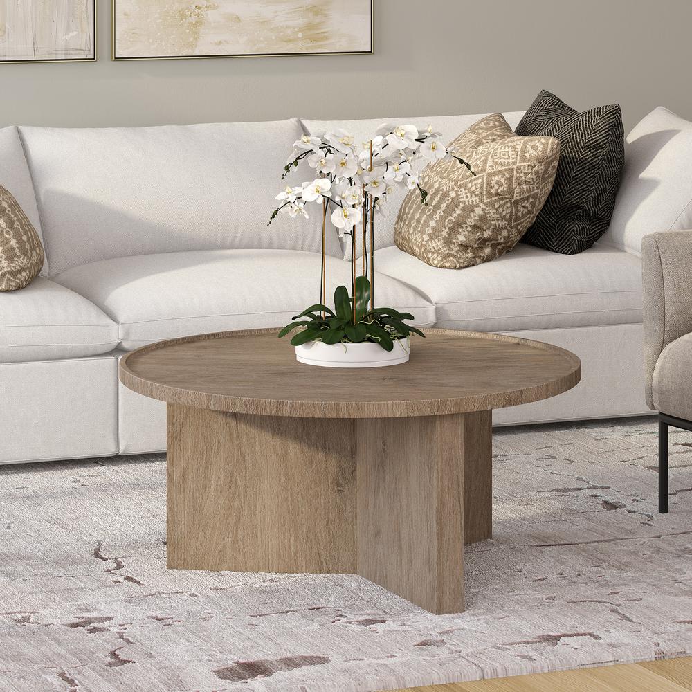 Gunnar 32" Wide Round Coffee Table in Antiqued Gray Oak. Picture 3