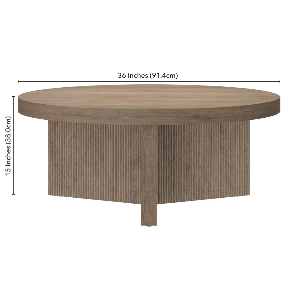Holm 36" Wide Round Coffee Table in Antiqued Gray Oak. Picture 5
