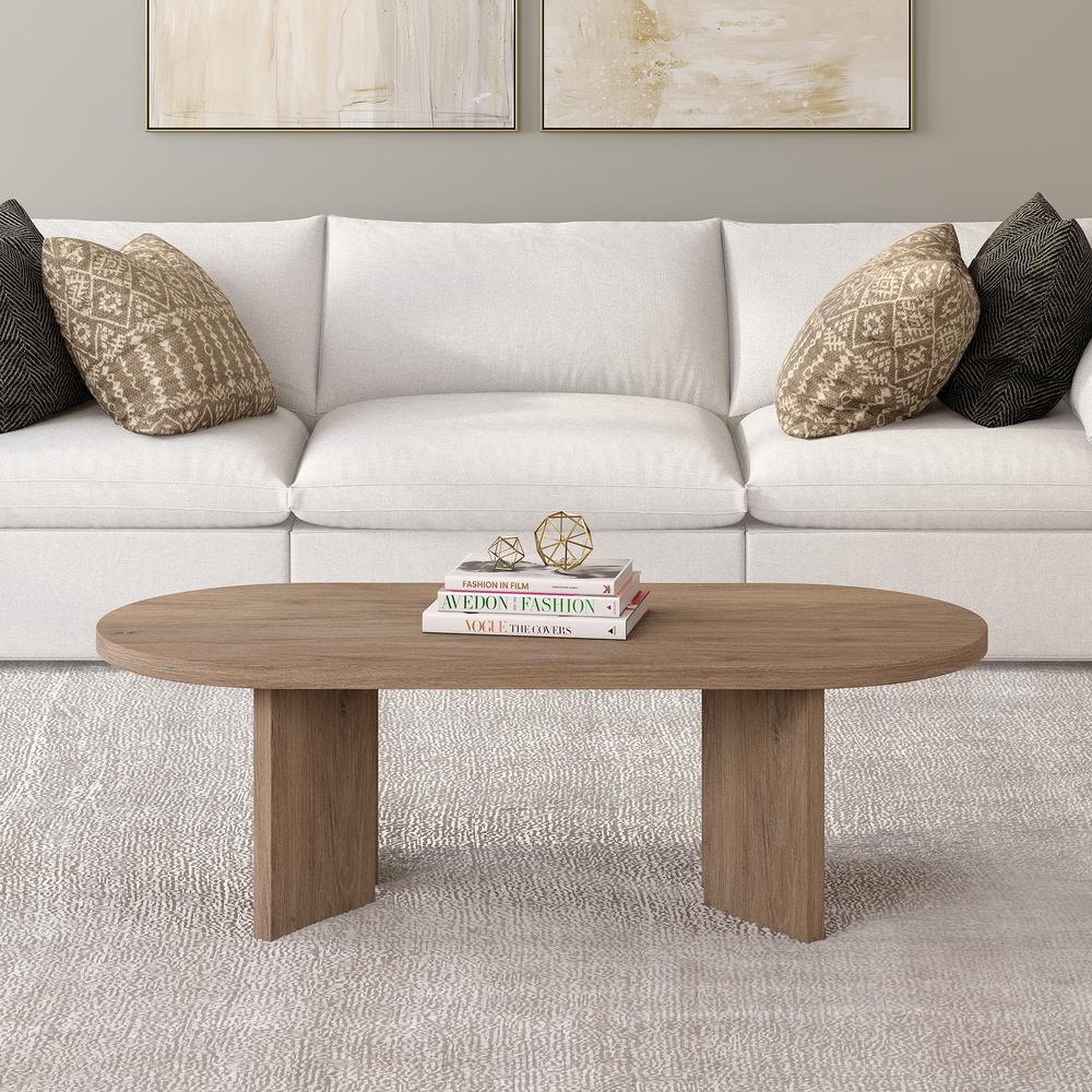 Alma 48" Wide Oval Coffee Table in Antiqued Gray Oak. Picture 4