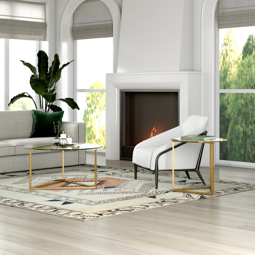 Jenson 24" Wide Round Side Table in Brass. Picture 4