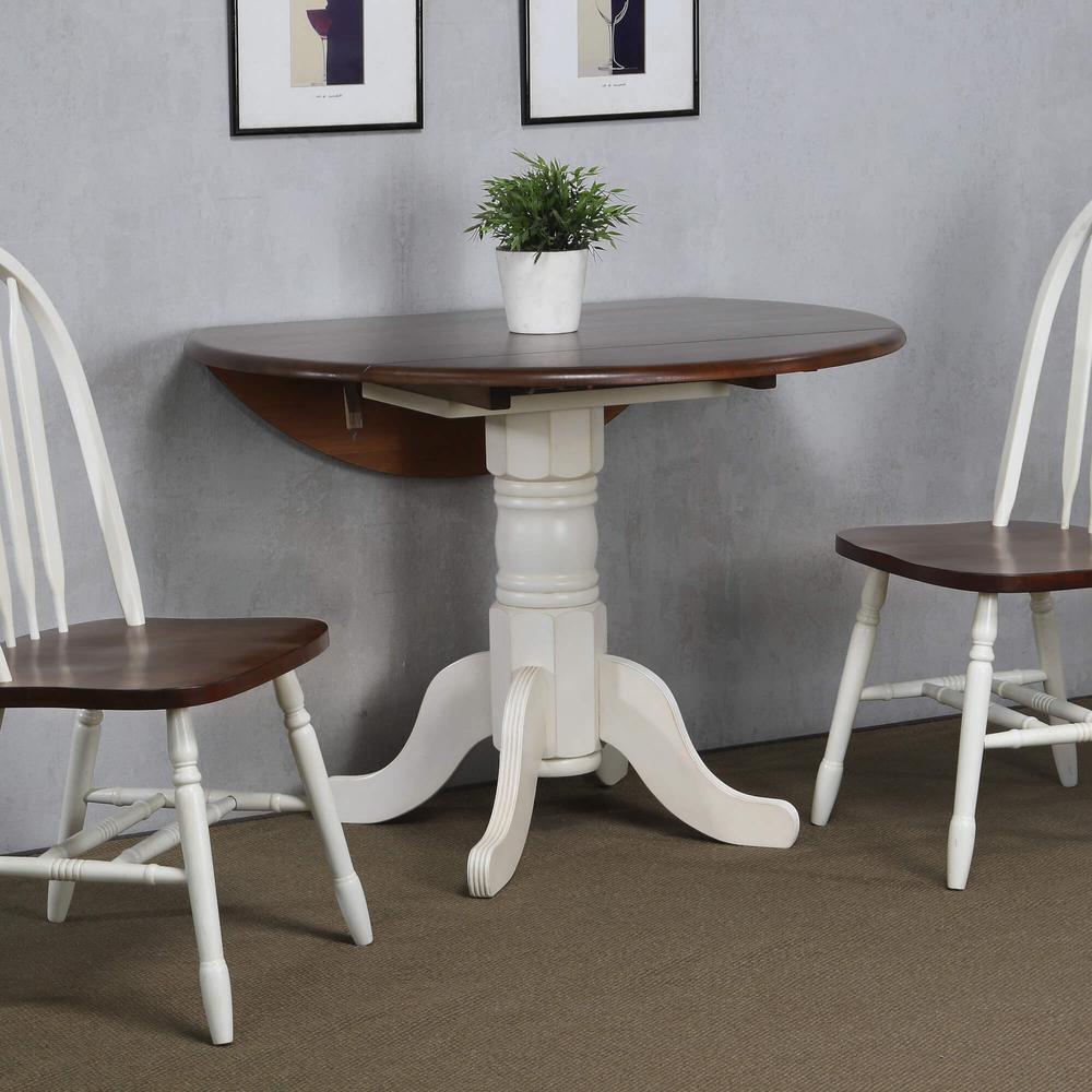 Andrews 42" Round Extendable Drop Leaf Dining Table. Picture 2
