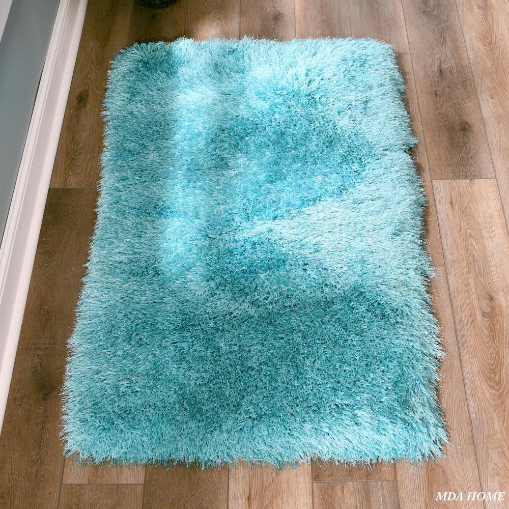 MANHATTTAN 06  TURQUOISE 2'5 X 4'5 RECTANGLE. Picture 1