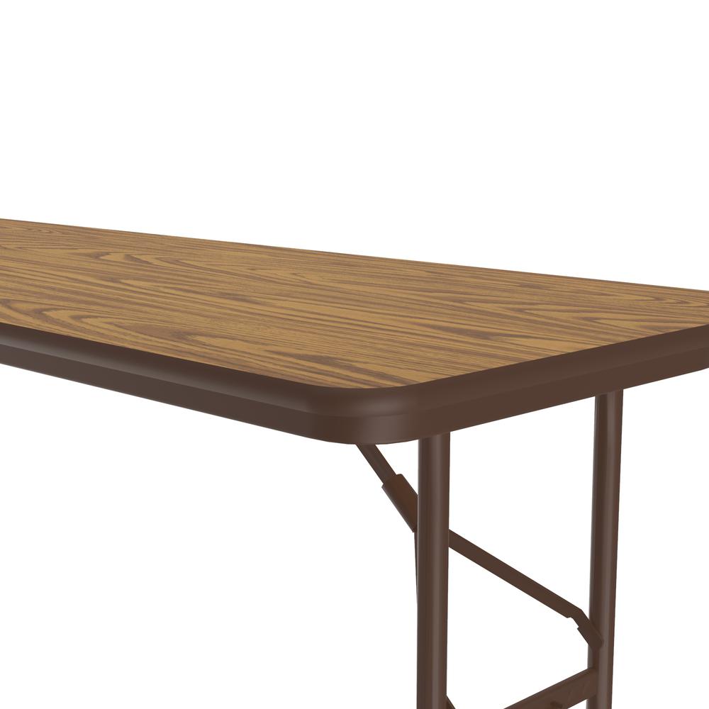 Adjustable Height Econoline Melamine Top Folding Table 24x72" RECTANGULAR, MED OAK BROWN. Picture 6