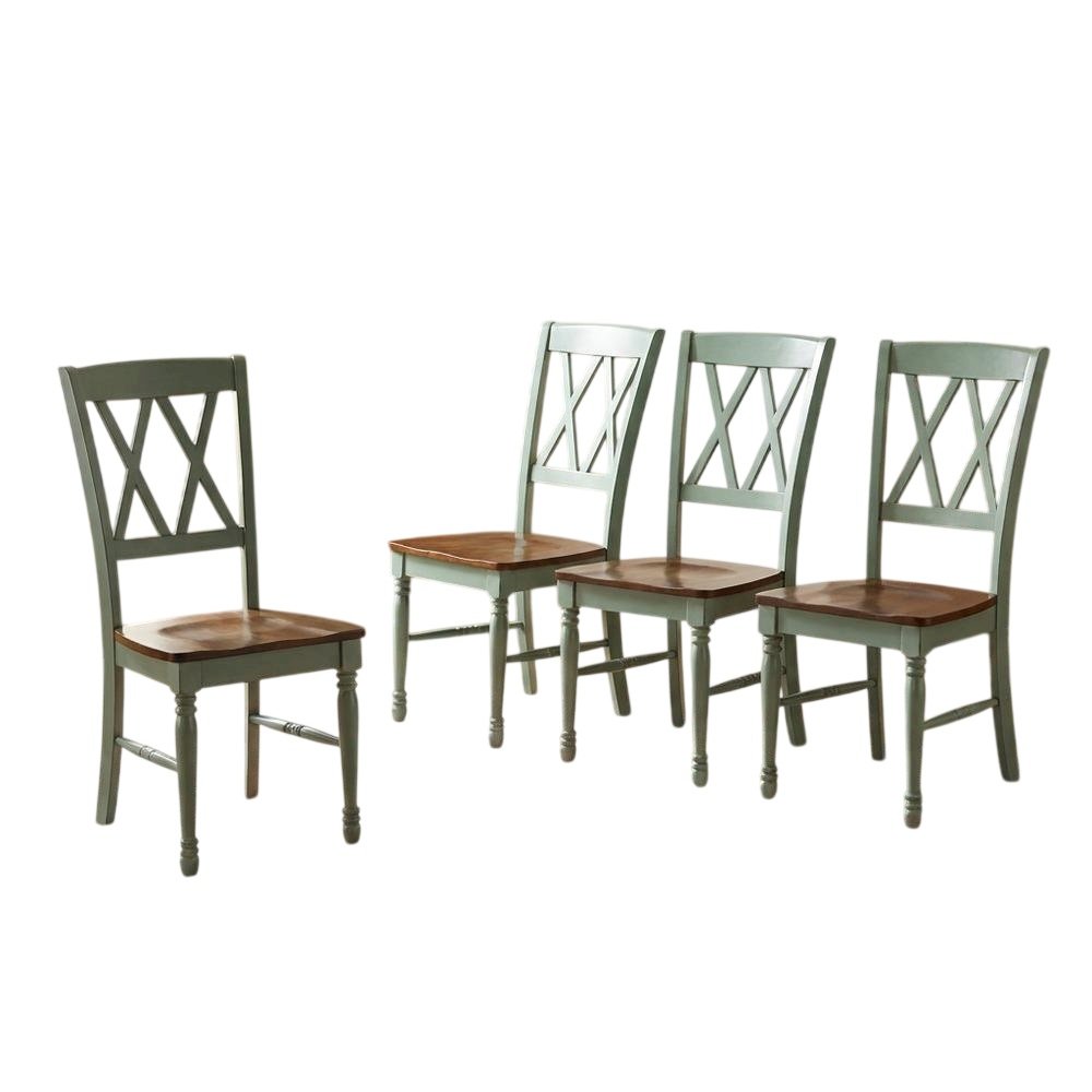 Set of four dining chairs with ergonomic back support and sturdy construction. Picture 1
