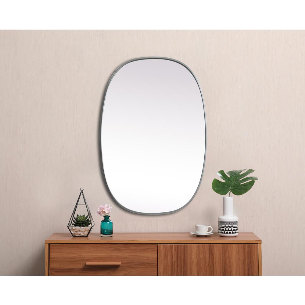 Metal Frame Oval Mirror 27x40 Inch in Silver. Picture 3