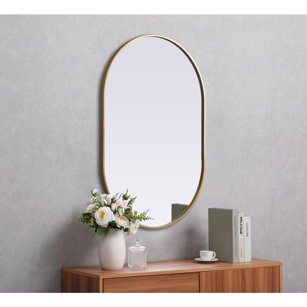 Metal Frame Oval Mirror 27x40 Inch in Brass. Picture 4