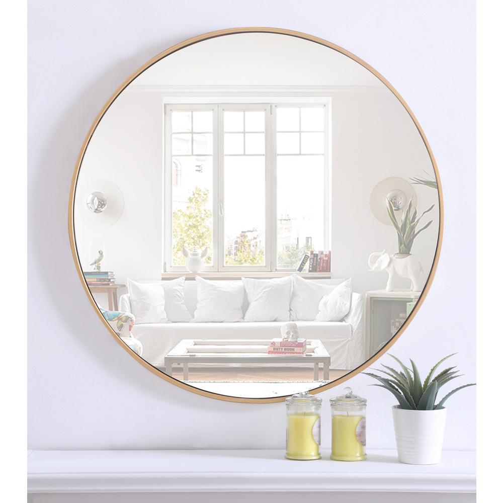 Metal frame Round Mirror 32 inch Brass finish. Picture 9