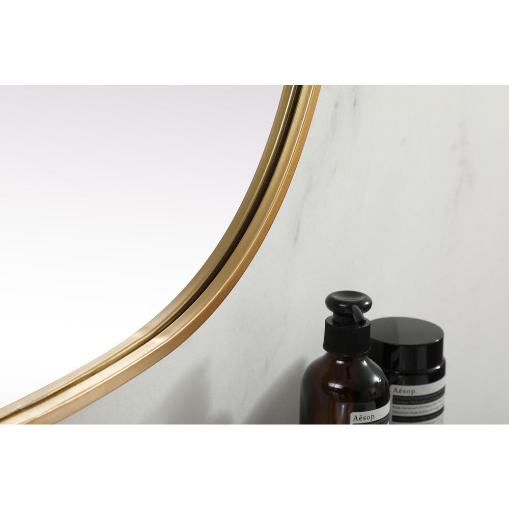 Metal Frame Oval Mirror 27x36 Inch in Brass. Picture 6