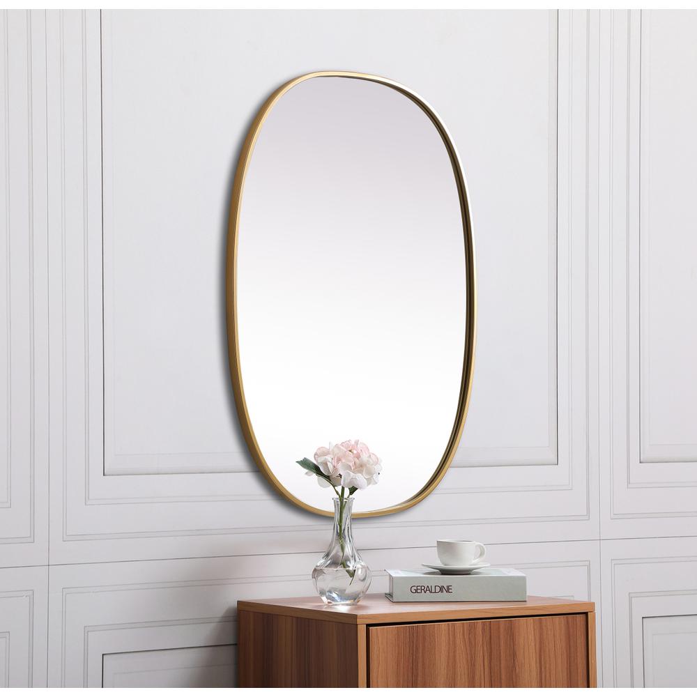 Metal Frame Oval Mirror 27x36 Inch in Brass. Picture 4