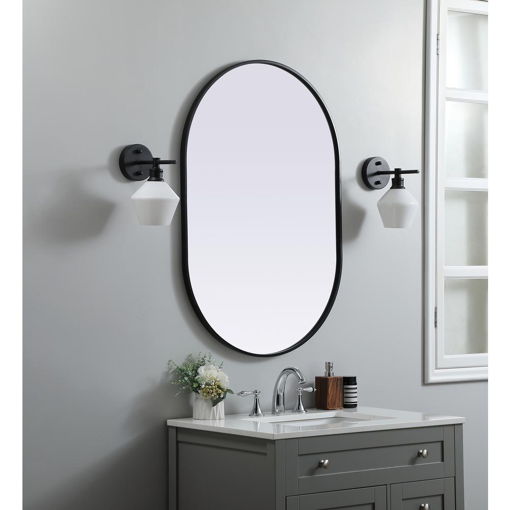 Metal Frame Oval Mirror 27x40 Inch in Black. Picture 2