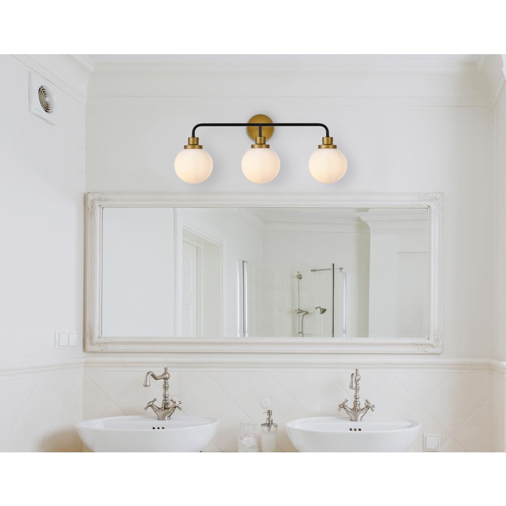Hanson 3 lights bath sconce in black with brass with frosted shade. Picture 6