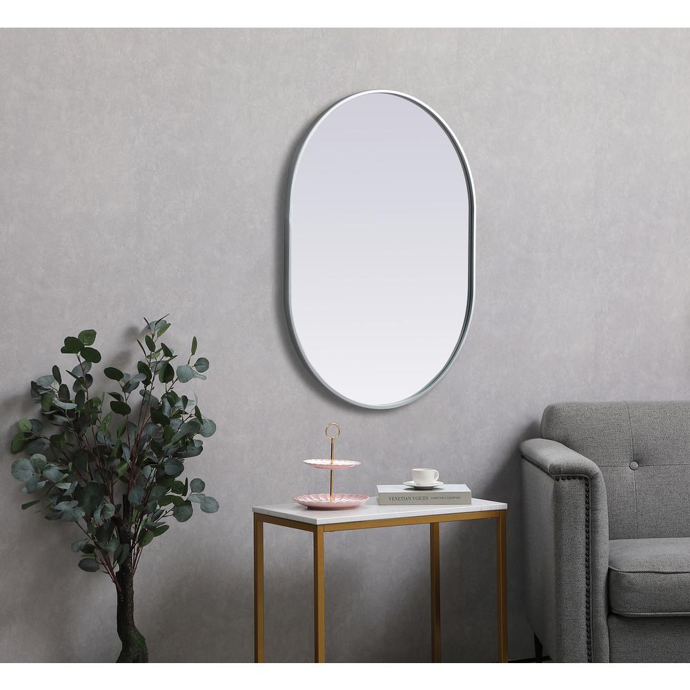 Metal Frame Oval Mirror 27x36 Inch in Silver. Picture 4