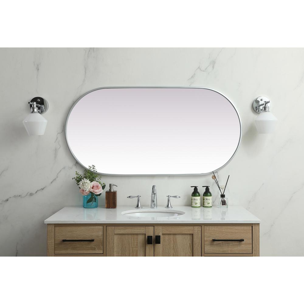 Metal Frame Oval Mirror 24x48 Inch in Silver. Picture 3