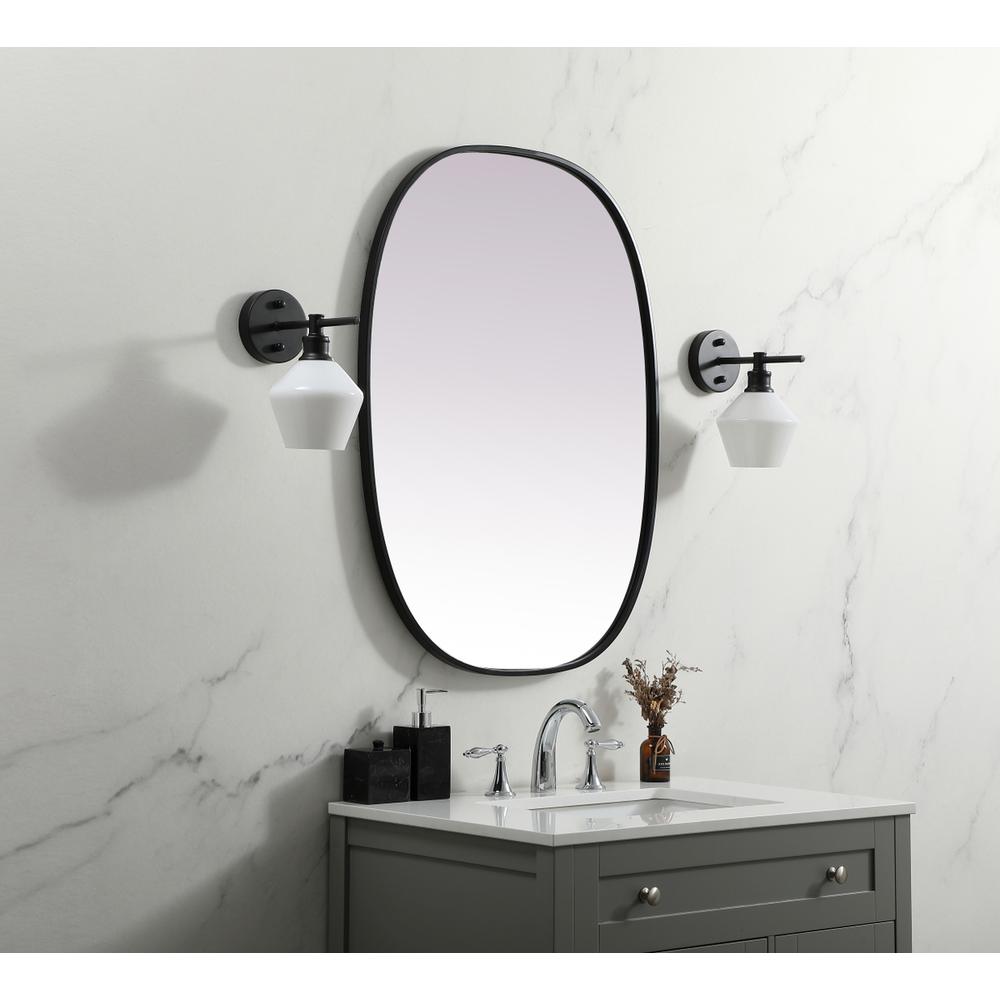 Metal Frame Oval Mirror 27x36 Inch in Black. Picture 2