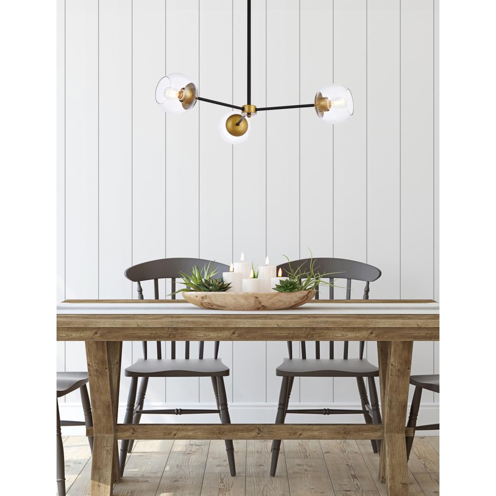 Briggs 32 inch pendant in black and brass with clear shade. Picture 8