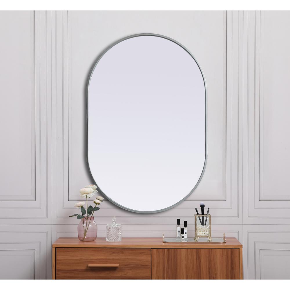 Metal Frame Oval Mirror 27x40 Inch in Silver. Picture 3