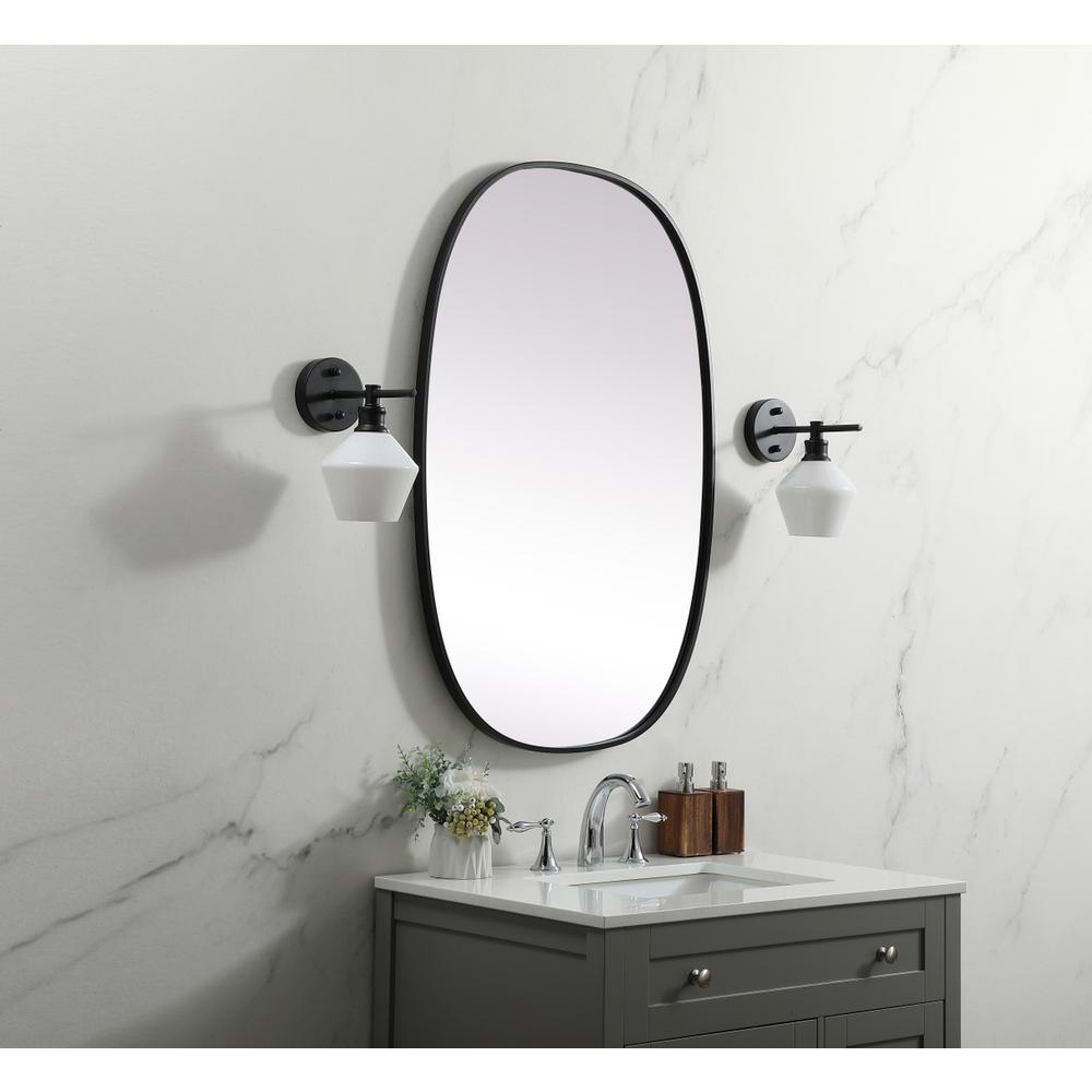 Metal Frame Oval Mirror 27x40 Inch in Black. Picture 2