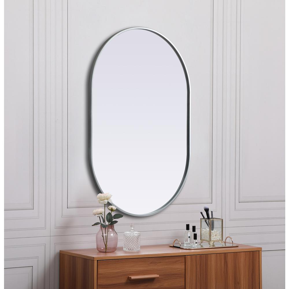 Metal Frame Oval Mirror 27x40 Inch in Silver. Picture 4