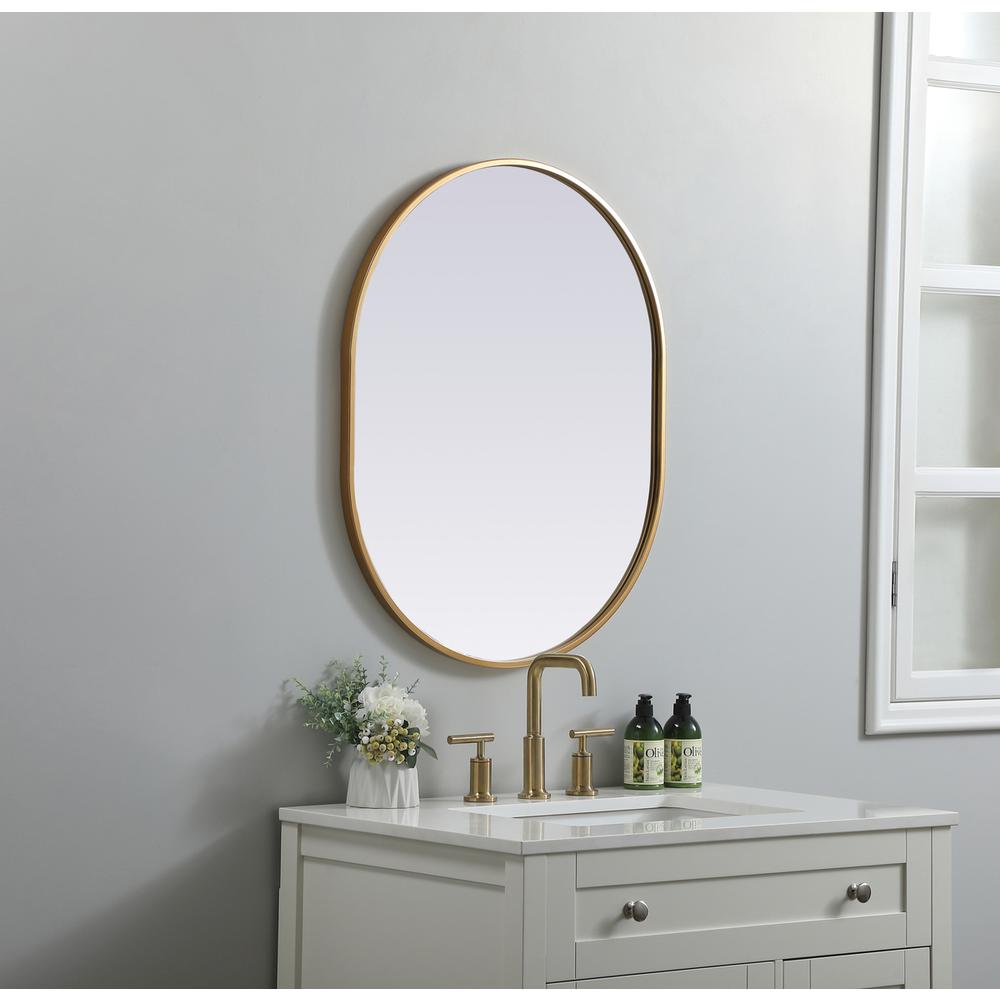 Metal Frame Oval Mirror 24x30 Inch in Brass. Picture 2
